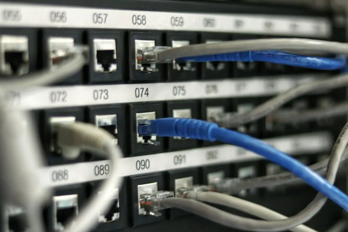 Server room with blue lit racks